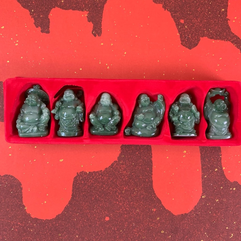 Set of 6 Lucky Buddha statues.